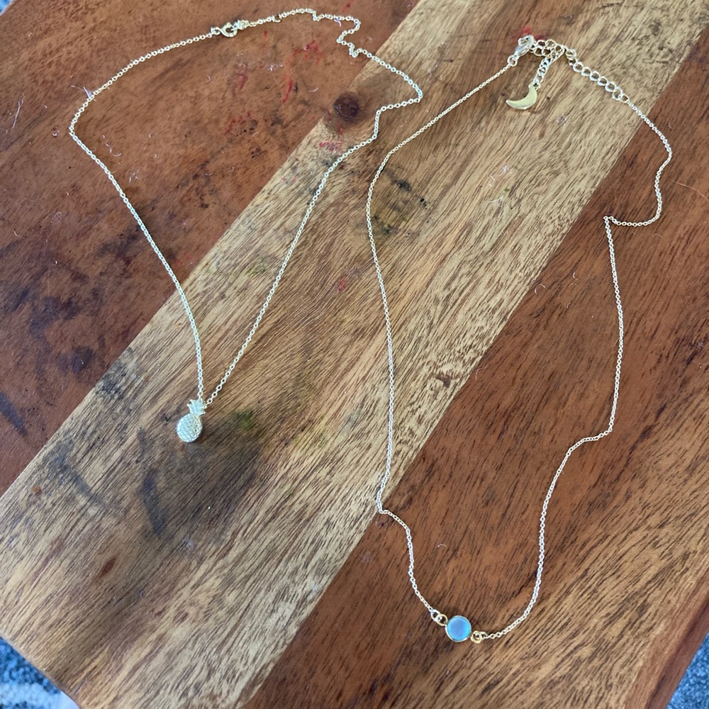Gold necklaces. Cute. Great for layering.